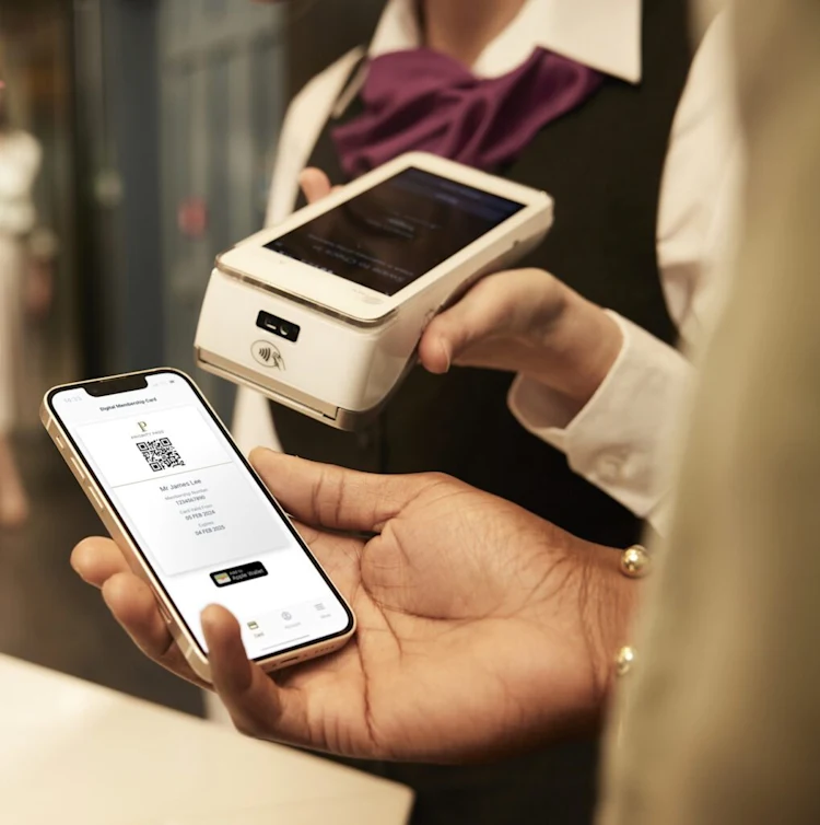 The Priority Pass digital membership card scanned at a lounge reception